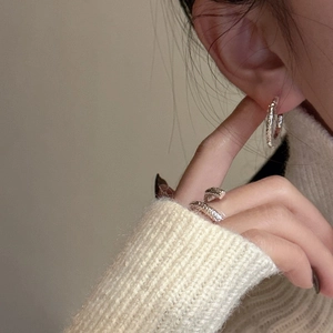 Minimalist S925 sterling silver ring and earring set with irregular lava texture design