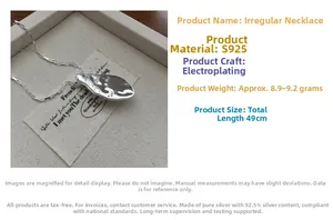 Detail of S925 sterling silver hammered teardrop pendant with rectangular link chain