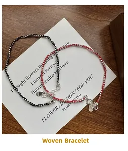 Détails des perles en argent S925 sur bracelets en corde tressée rouge et noire