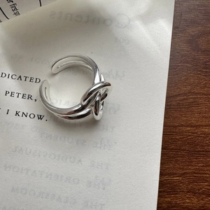 Minimalist S925 sterling silver knotted double-layer open ring on vintage paper