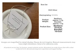 Detailed view of S925 silver bow knot necklace and bracelet set on a decorative plate
