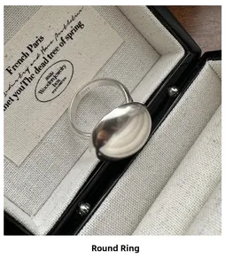 Macro shot of matte S925 sterling silver dome ring inside a premium jewelry box