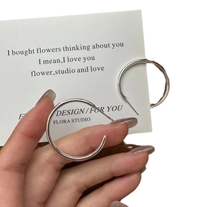 Polished S925 sterling silver hoop earrings with a sleek minimalist circular design