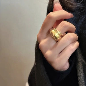 Polished thick gold band ring in a minimalist chunky design for a modern classic look