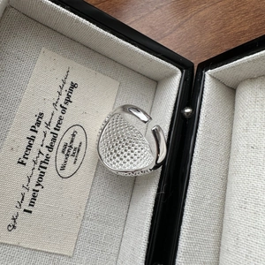 Modern S925 sterling silver open ring with unique honeycomb hollow texture in a jewelry box