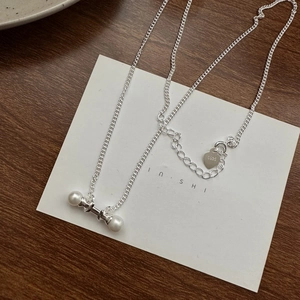 Elegant S925 sterling silver bar necklace with freshwater pearls on a minimalist chain
