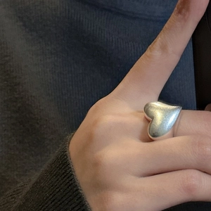 Minimalist S925 sterling silver heart ring with a matte finish and modern 3D design