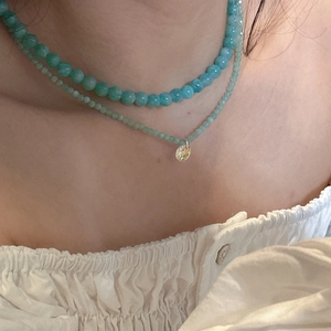 S925 sterling silver layered necklace with mint green beads and a gold pendant