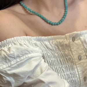 S925 sterling silver necklace with mint green beads worn on model for elegant styling