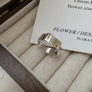 S925 sterling silver wrinkled ring with irregular wavy texture in a jewelry box