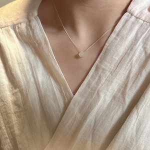 S925 sterling silver necklace featuring a pale green translucent irregular natural stone
