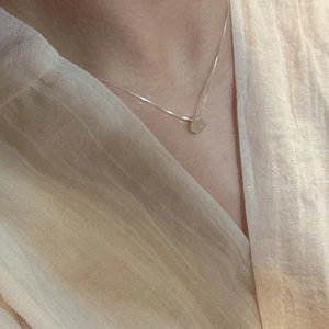 Minimalist S925 sterling silver necklace with irregular natural stone pendant on model