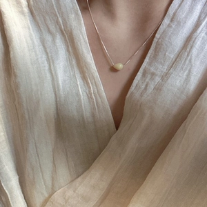 Elegant S925 sterling silver necklace with a minimalist yellow teardrop stone pendant