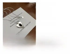 Detail of S925 silver heart necklace with black onyx showing 39+5cm size and weight