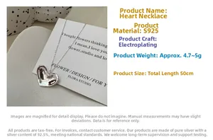 Close-up of S925 sterling silver heart necklace showing plated finish and 50cm chain