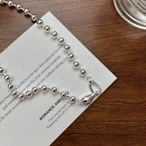 Polished S925 sterling silver bead necklace featuring a unique teardrop lobster clasp