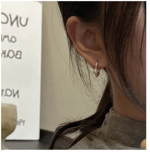 Close-up of S925 silver pearl drop earrings on model showcasing elegant minimalist style