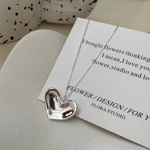 Minimalist S925 sterling silver heart necklace with irregular 3D pendant and mirror finish