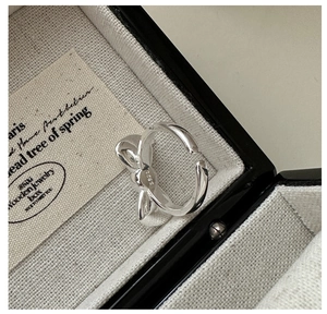 Detailed view of the S925 sterling silver bow ring with official hallmark engraving