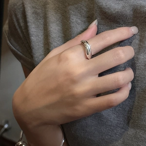 Minimalist S925 sterling silver wide band ring with sleek wave texture on hand