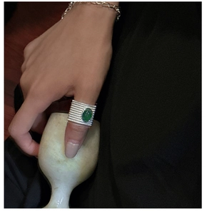 Detailed view of an S925 sterling silver vintage wide ring with a green agate gemstone