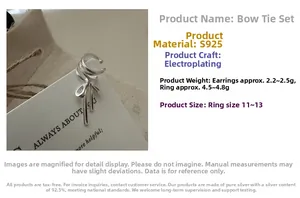 Makroaufnahme des S925 Sterlingsilber Schleifen Schmucksets mit Clip Ohrringen und Ring