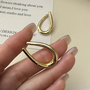 Minimalist S925 sterling silver gold-plated teardrop hoop earrings with high polished finish
