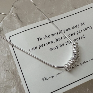 Minimalist S925 sterling silver snake chain necklace with polished multi-ring pendant