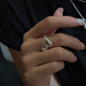 S925 sterling silver hollow heart ring featuring a minimalist 3D design for women