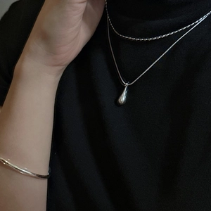 Minimalist S925 sterling silver waterdrop pendant necklace and sleek cuff bracelet set