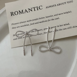 S925 sterling silver bow earrings with twisted rope texture in a minimalist retro style