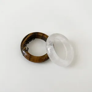 Minimalist natural stone ring set featuring tiger eye and white crystal bands