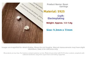 Macro detail of S925 sterling silver bean stud earrings with brushed metal texture