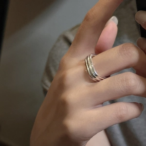 Minimalist S925 sterling silver multi-layer wave ring with polished finish on finger