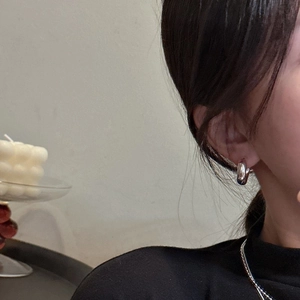 Minimalist S925 sterling silver hoop earrings with a polished finish and thin chain necklace
