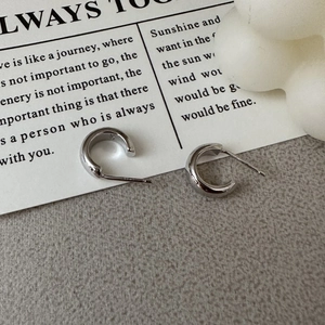 Minimalist S925 sterling silver C-shape hoop earrings with a polished metallic finish