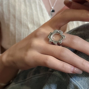 Elegant S925 sterling silver frangipani flower ring with polished wave design on finger