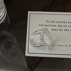 S925 sterling silver minimalist spiral textured open ring on a vintage quote card