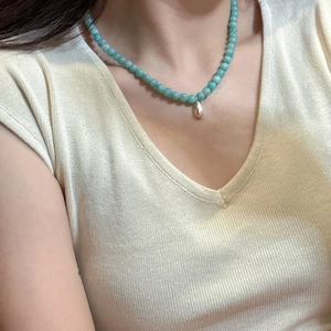 S925 silver beaded necklace with light green natural stone and a silver water drop pendant