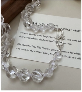 Artistic S925 silver necklace with transparent twisted glass beads on a poetic card