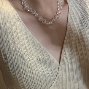Elegant S925 sterling silver necklace with clear white crystal beads on a model