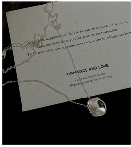Detail of S925 silver irregular square pendant with polished mirror finish and lobster clasp