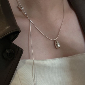 S925 sterling silver drop pendant necklace with adjustable snake chain on female model