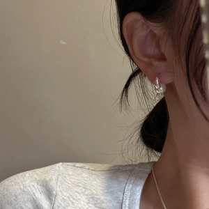 Elegant S925 sterling silver pearl earrings for women worn on model for a modern look