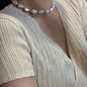 Elegant S925 silver necklace with irregular baroque pearls and silver spacer beads
