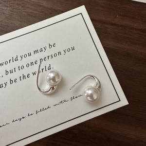 Elegant S925 sterling silver hook earrings with white pearls on a minimalist card