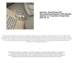 Detailed view of an S925 sterling silver ring featuring a white Mabe pearl inlay