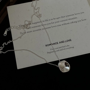 Minimalist S925 sterling silver necklace with an irregular concave round pendant