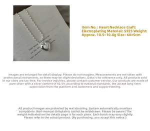 Detail view of S925 silver heart necklace showing 60+5cm length and 10.5g weight