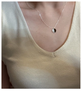 Minimalist S925 sterling silver necklace with two-tone round pendant on model neck